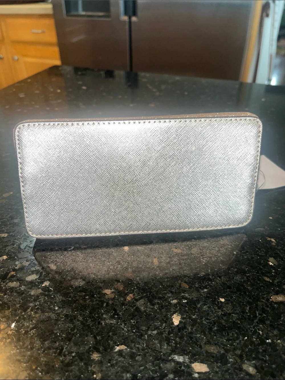 Kate Spade glittery rose gold cosmetic pouch